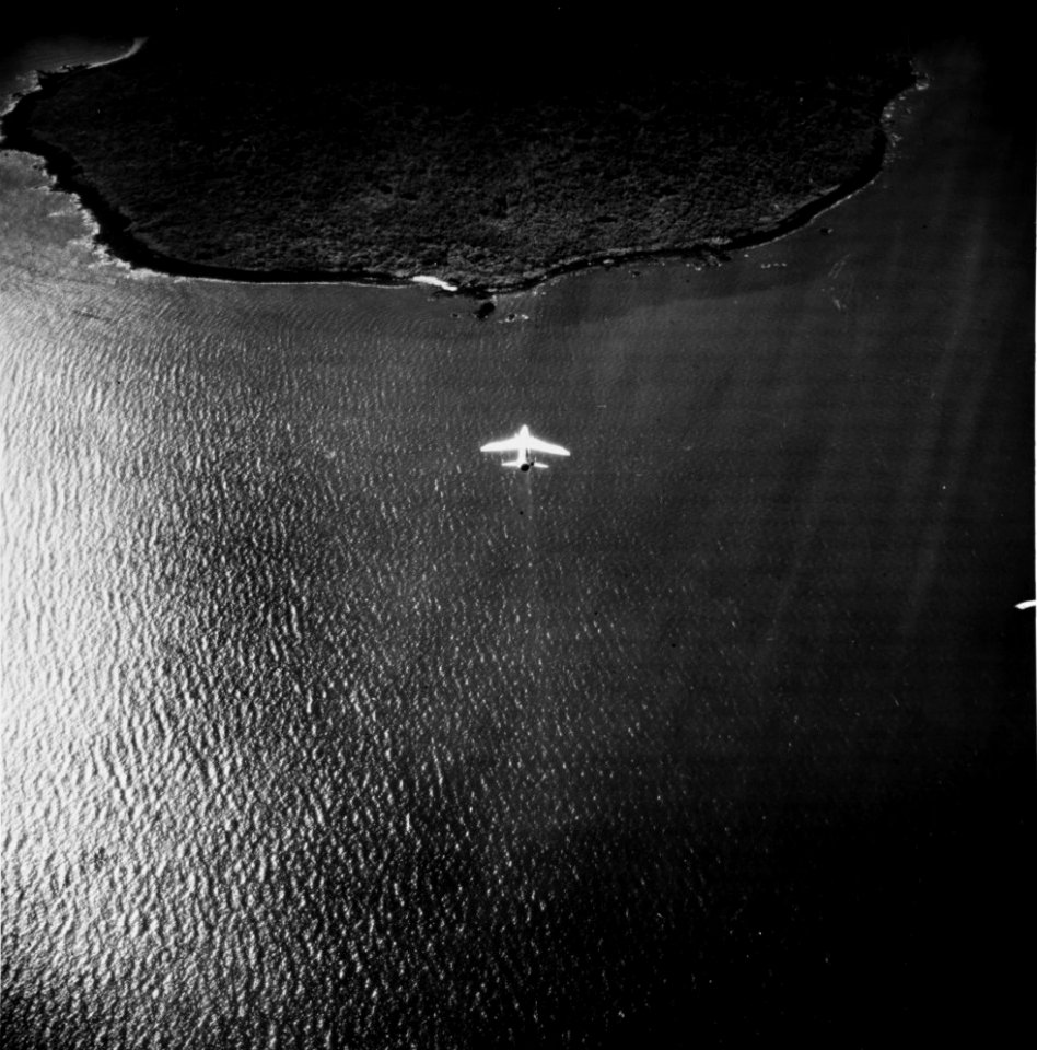Vought F-8E Crusader of VF-162 attacks targets on Cồn Cỏ island, Vietnam, 26 August 1965 (USN 1112803)