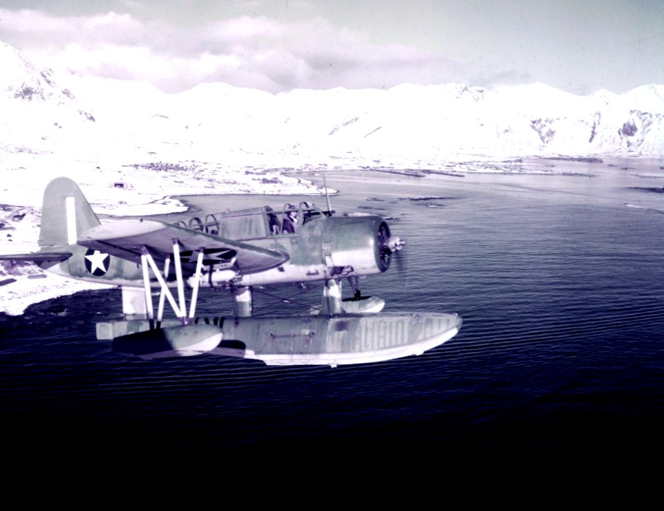 Vought OS2U Kingfisher of VS-56 in flight over Massacre Bay Area, Attu, Alaska (USA), on 16 November 1943 (80-G-K-1536)