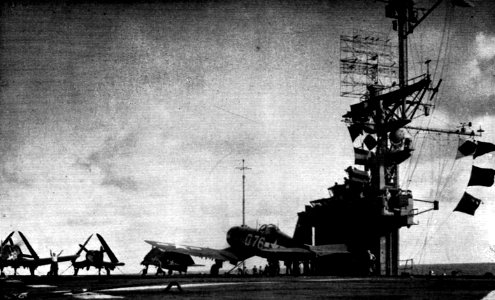 Vought F4U-1 Corsairs landing aboard USS Tripoli (CVE-64), in 1945