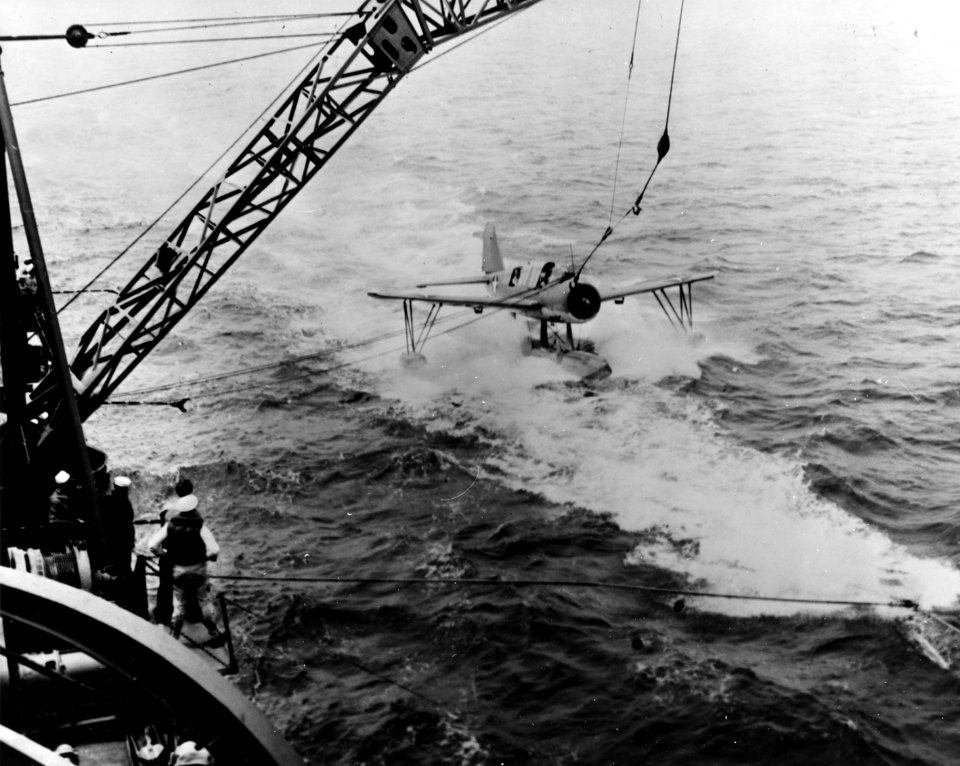 Vought OS2U Kingfisher is recovered by USS Stevens (DD-479) during tests, in 1943 (80-G-299540)