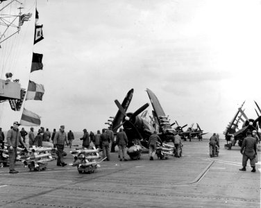Vought F4U-4B Corsairs of VMF-323 aboard USS Badoeng Strait (CVE-116) off Korea, 1 December 1950 (NH 97059)