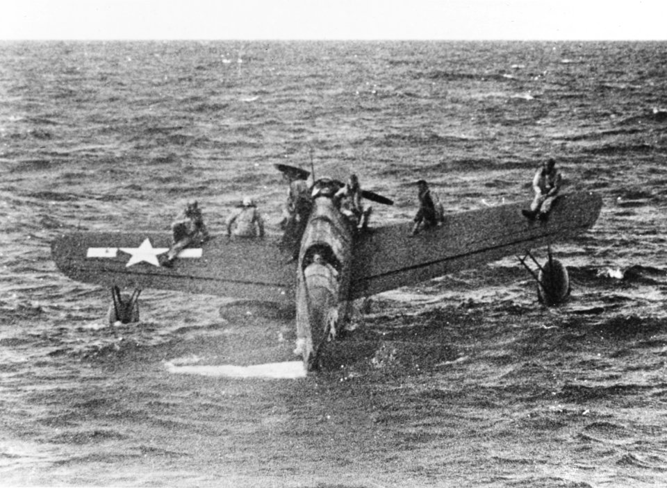 Vought OS2U Kingfisher with rescued airmen off Truk on 1 May 1944 (80-G-227991)