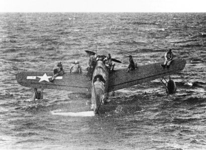 Vought OS2U Kingfisher with rescued airmen off Truk on 1 May 1944 (80-G-227991)