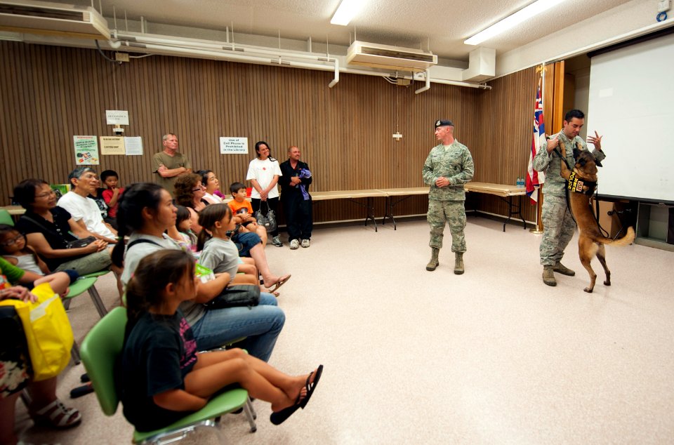 Wahiawa Public Library hosts military working dog demonstration 150618-N-WC566-058