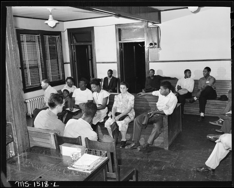 Waiting room at early afternoon clinic. This office has three periods daily for clinics with from three to five... - NARA - 540834