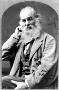 Walt Whitman, three-quarter length portrait, facing left, right hand under head LCCN97505148