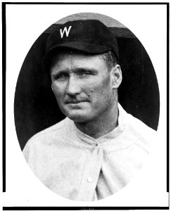 Walter Johnson, head-and-shoulders portrait, facing left, in oval LCCN93510963