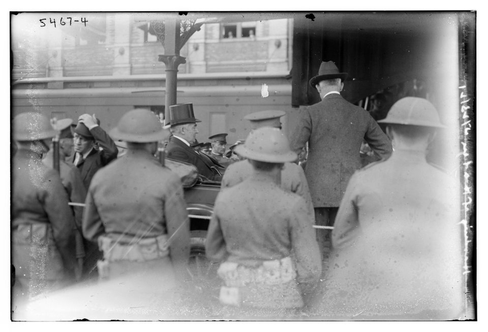Warren G. Harding and wife riding in back of car LCCN2014719654