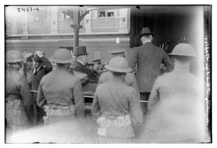 Warren G. Harding and wife riding in back of car LCCN2014719654