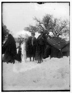 Snow in Jerusalem, 1921. Arab women in snow near tent LOC matpc.00796
