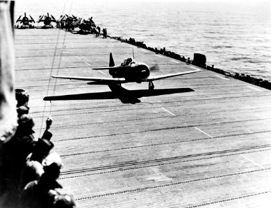 SNJ Texan taking off from USS Hoggatt Bay, circa in 1944 (UA 571.23)