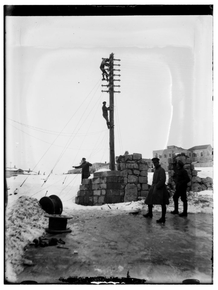 Snow in Jerusalem, 1921. British soldiers putting up electrical lines LOC matpc.00792
