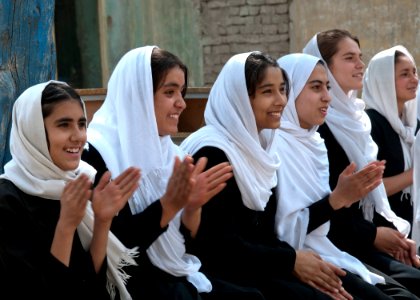 Student from Setara High school watch their classmates play volleyball. (8014490496)