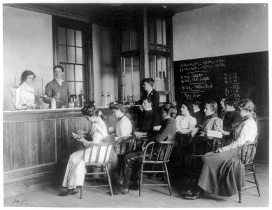 Students in a chemistry class observing others conducting an experiment, Western High School, Washington, D.C. LCCN2001699125