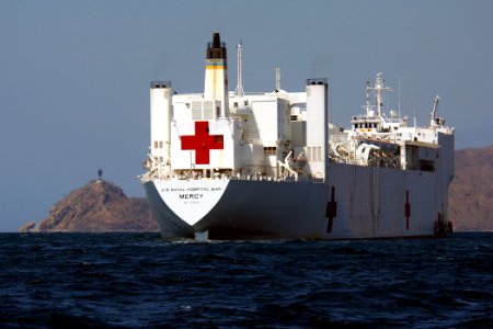 US Navy 060829-N-6501M-044 The Military Sealift Command hospital ship USNS Mercy (T-AH 19) sits off the coast of Dili