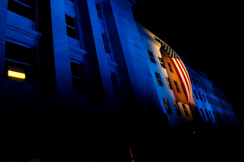 US Navy 060910-N-0696M-225 A memorial flag and lights illuminate the spot where American Airlines Flight 77 crashed into the Pentagon on Sept. 11, 2001