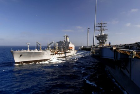 US Navy 060901-N-8158F-063 The Military Sealift Command (MSC) fleet replenishment oiler USNS Pecos (T-A0 197) pulls along side the nuclear-powered aircraft carrier USS Nimitz (CVN 68)