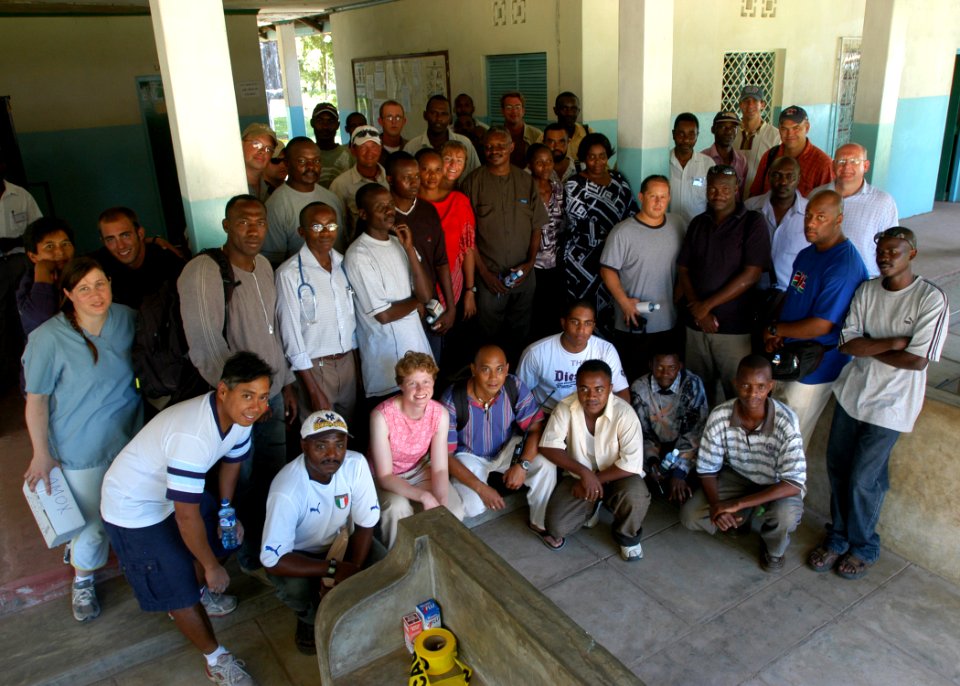 US Navy 060919-N-1328C-268 Medical personnel from the Kenyan navy and U.S. military stand together for a photo to remember the Medical Civic Action Program (MEDCAP) visit to Witu, Kenya