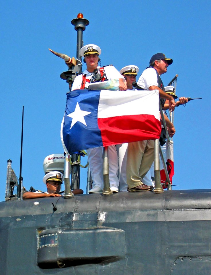 US Navy 060904-N-4541S-001 Officers aboard the attack submarine USS Texas (SSN 775) direct mooring operations from the bridge as the boat arrives in Galveston, Texas