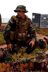 US Navy 060829-N-9818V-066 Master-at-Arms Jason Pingeton assigned to Mobile Security Squadron Three (MSS-3), participates in drills conducted at Camp Fish in support of Exercise Seahawk 2006