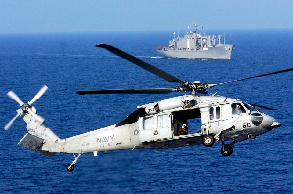 US Navy 060908-N-8604L-004 An MH-60S Seahawk assigned to Helicopter Sea Combat Support Squadron Two Five (HCS-25) lifts from USS Kitty Hawk's (CV 63)