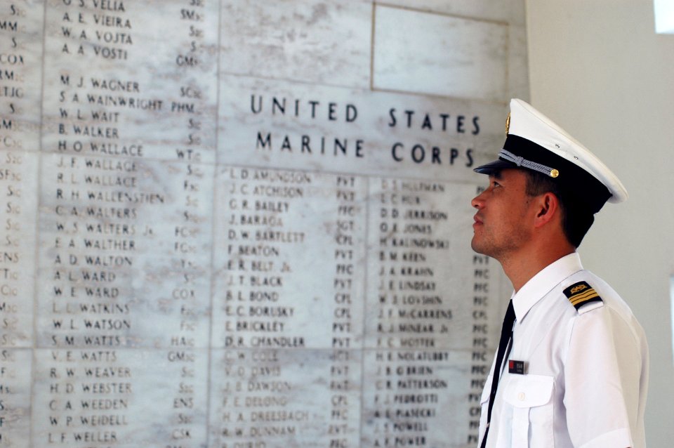 US Navy 060907-N-4965F-009 A Sailor from the Chinese Navy views the shrine area of USS Arizona Memorial during a historical white boat tour of Pearl Harbor