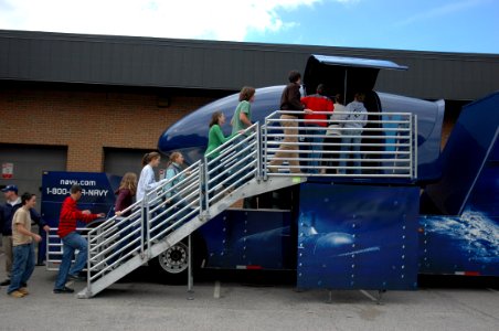 US Navy 061013-N-5531C-001 Students at Broughton High School have a chance to soar with the Blue Angels by taking a ride on the Blue Angels' F-A-18 Flight Simulator. The simulator toured area high schools as part of Navy Week