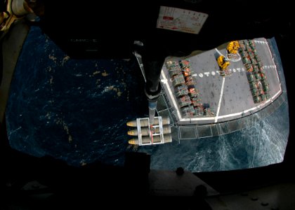 US Navy 060907-N-0490C-014 An MH-60S Seahawk helicopter, assigned to the Dragon Whalers of Helicopter Sea Combat Squadron Two Eight (HSC-28), transfers ordnance