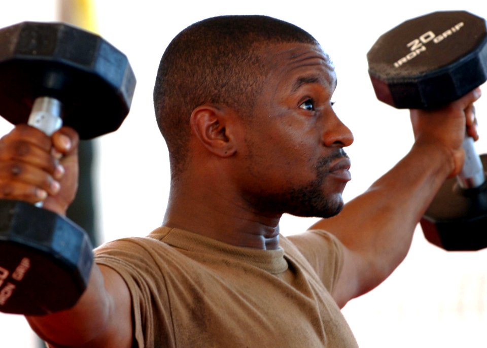 US Navy 060904-N-1328C-033 Equipment Operator 2nd Luis Martinez competes in Camp Lemonier Labor Day Strong Man Competition