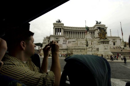 US Navy 061019-N-5330L-002 A Sailor from the Nimitz-class aircraft carrier USS Dwight D. Eisenhower (CVN 69) takes a photograph of historic buildings during a tour of Rome, Oct. 19