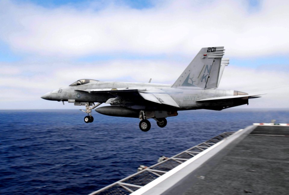US Navy 060901-N-0413R-050 An F-A-18E Super Hornet assigned to the Fighting Redcocks of Strike Fighter Squadron Two Two (VFA-22) launches from the flight deck aboard the nuclear-powered aircraft carrier USS Nimitz (CVN 68)