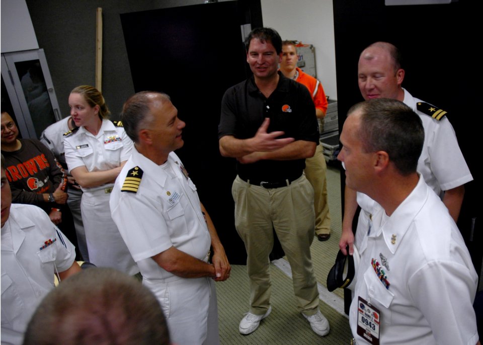 US Navy 060831-N-1805P-008 Sailors from amphibious transport dock ship USS Cleveland (LPD 7) were welcomed by legendary former Cleveland Browns quarterback Bernie Kosar
