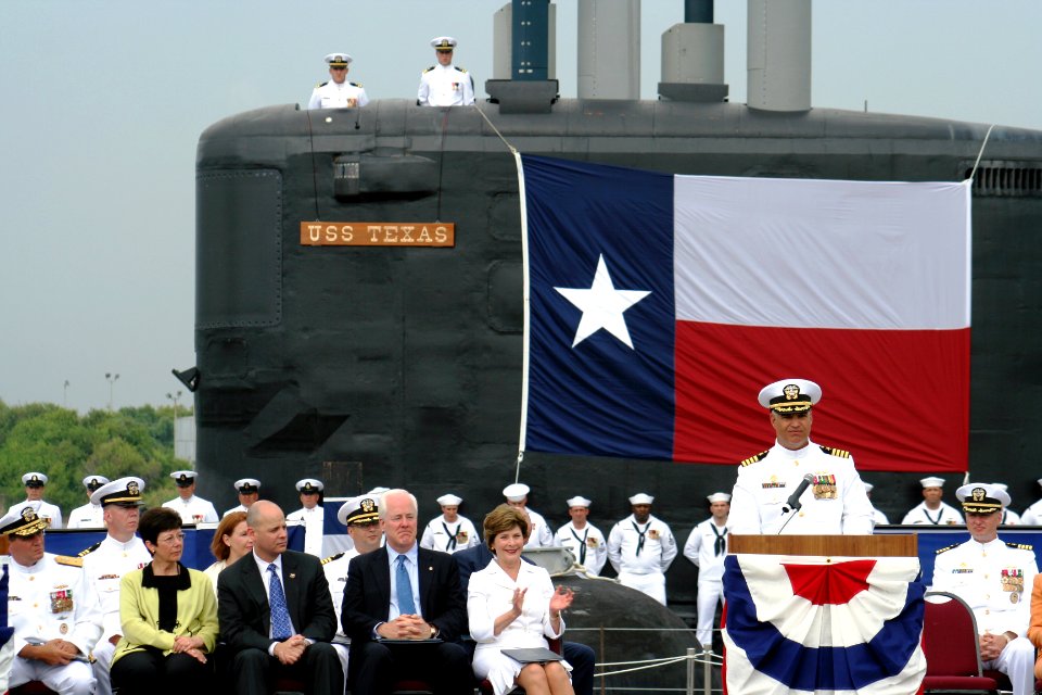 US Navy 060909-N-0653J-007 The Commanding Officer of the Virginia-class attack submarine USS Texas (SSN 775), Capt. John J. Litherland, addresses assembled guests and dignitaries during the boats commissioning ceremony