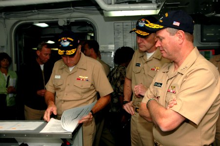 US Navy 060906-N-2659P-136 Vice Adm. Walter Massenburg receives feedback from Stennis leadership concerning Boots on the deck during a visit to the Nimitz-class aircraft carrier USS John C. Stennis (CVN 74)