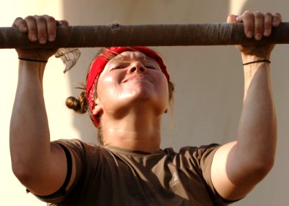 US Navy 060904-N-1328C-088 Construction Electrician 3rd Class Heidi Gifford, from Salisbury, Md., competes in Camp Lemonier Labor Day Strong Man Competition
