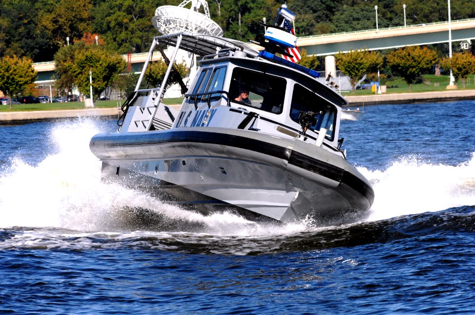 US Navy 061013-N-0593C-001 Sailors from Naval Coastal Warfare Squadron Four (NCWS-4) demonstrate their capabilities in the Severn River along the shores of the U.S. Naval Academy
