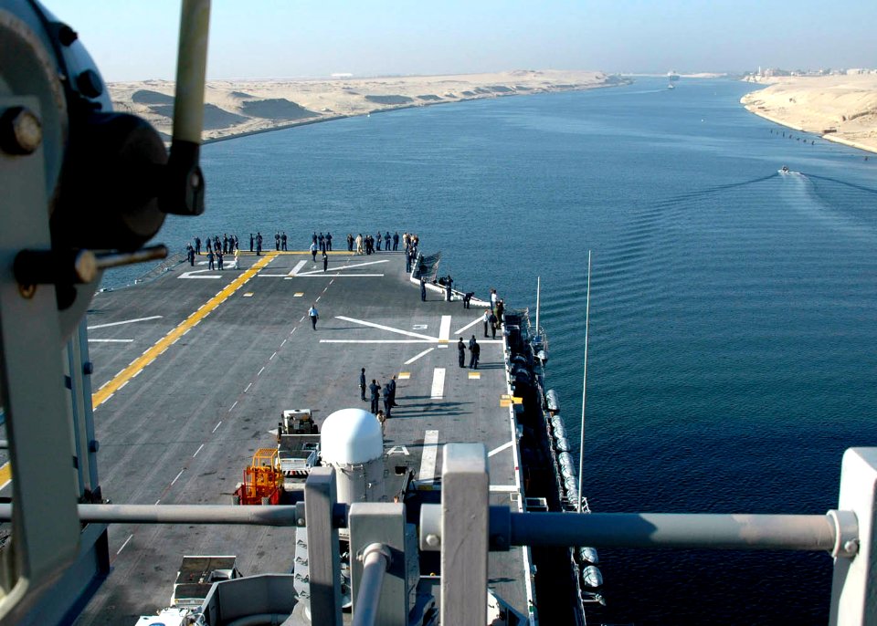 US Navy 060902-N-8547M-025 Sailors aboard the amphibious assault ship USS Saipan (LHA 2) view the scenery of Egypt from the ship's flight deck, as the ship transits south through the Suez Canal