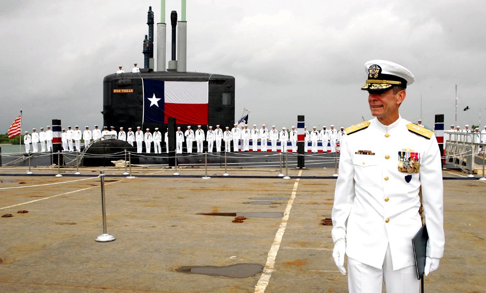 US Navy 060909-N-7441H-004 Commander Naval Submarine Forces, Vice Admiral Chuck Munns leads the exit procession at the completion of the commissioning ceremony of Virginia-class attack submarine USS Texas (SSN 775)