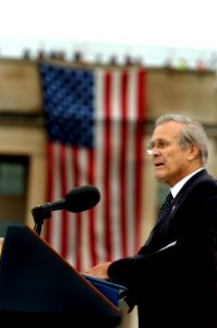 US Navy 060911-N-0696M-115 Secretary of Defense Donald H. Rumsfeld speaks to attendees at a memorial ceremony at the Pentagon remembering the 5th anniversary of terrorist attacks on the United States photo