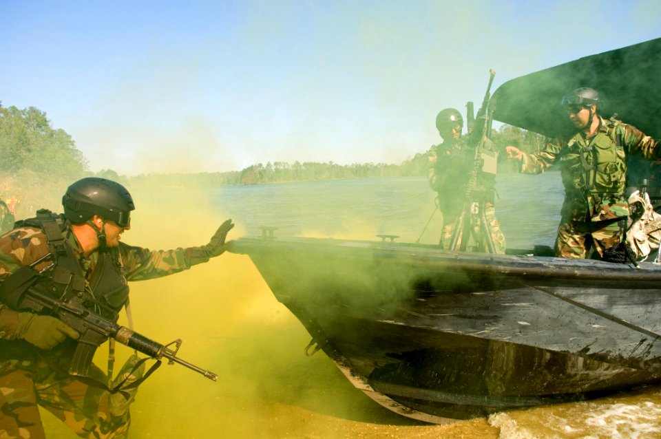 US Navy 061023-N-5319A-125 Sailors assigned to Naval Small Craft Instruction and Technical Training School (NAVSCIATTS) train personnel from the Iraqi Riverine Police Force on special boat maneuvers and weapon handling