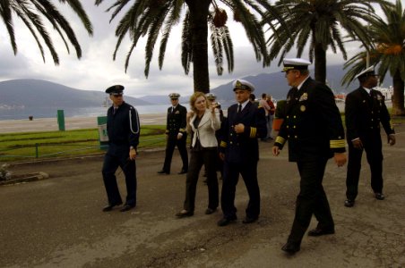 US Navy 061023-N-5330L-218 Capt. Perry Bingham, right, commanding officer of the guided-missile cruiser USS Anzio (CG 68), takes a walk through Tivat, Montenegro, with a Montenegrin representative after Anzio pulled into port