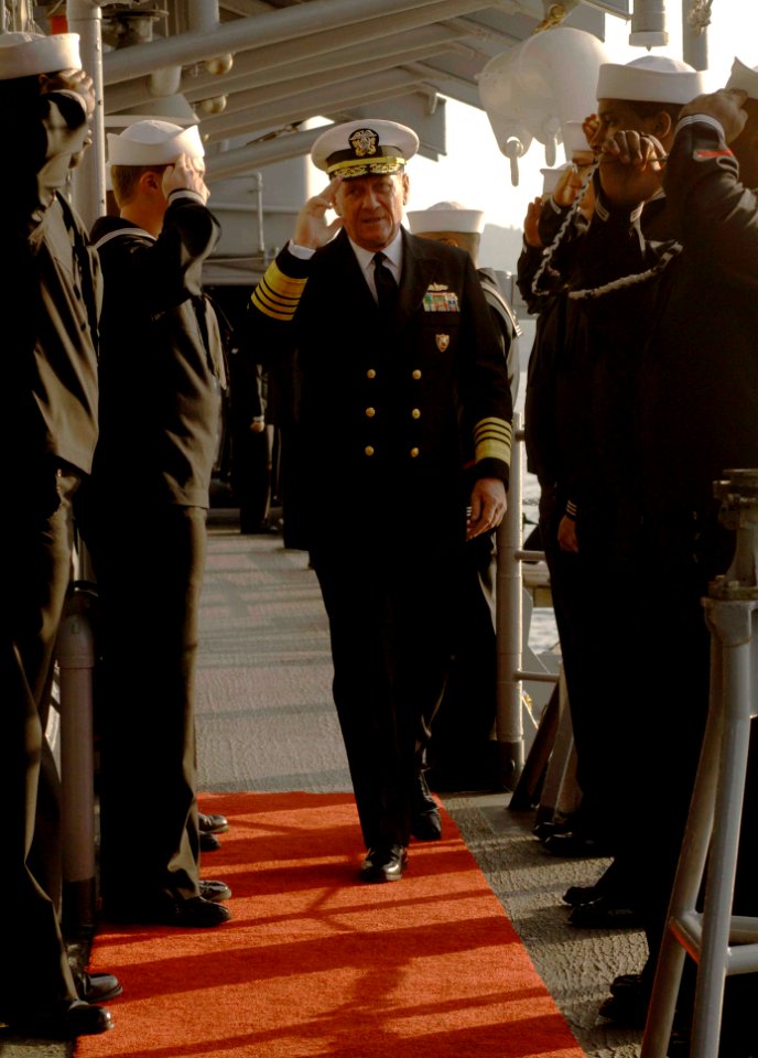 US Navy 061025-N-5330L-234 Commander, U.S. Naval Forces Europe Adm. Harry Ulrich III, salutes as he passes through the sideboys aboard the guided missile cruiser USS Anzio (CG 68) prior to a reception