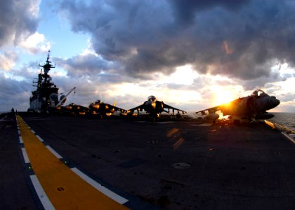 US Navy 061023-N-2636M-012 AV-8B Harriers line the flight deck of amphibious assault ship USS Bataan (LHD 5) as the ship sails in the Atlantic Ocean during Composite Training Unit Exercise (COMPTUEX)