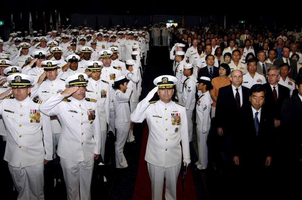 US Navy 060912-N-2468S-002 Vice Adm. Doug Crowder salutes as he arrives at the U.S. Seventh Fleet change-of-command ceremony