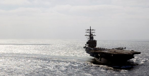 US Navy 061025-N-7130B-087 USS Ronald Reagan (CVN 76) turns to starboard following the first event of flight operations