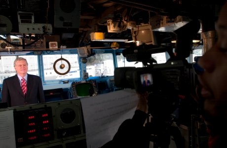US Navy 061024-N-9851B-003 U.S. Ambassador to Japan, Mr. Thomas Schieffer, makes a commercial on the bridge of guided-missile cruiser USS Shiloh (CG 67), stressing the importance for Sailors in Japan to be good ambassadors photo