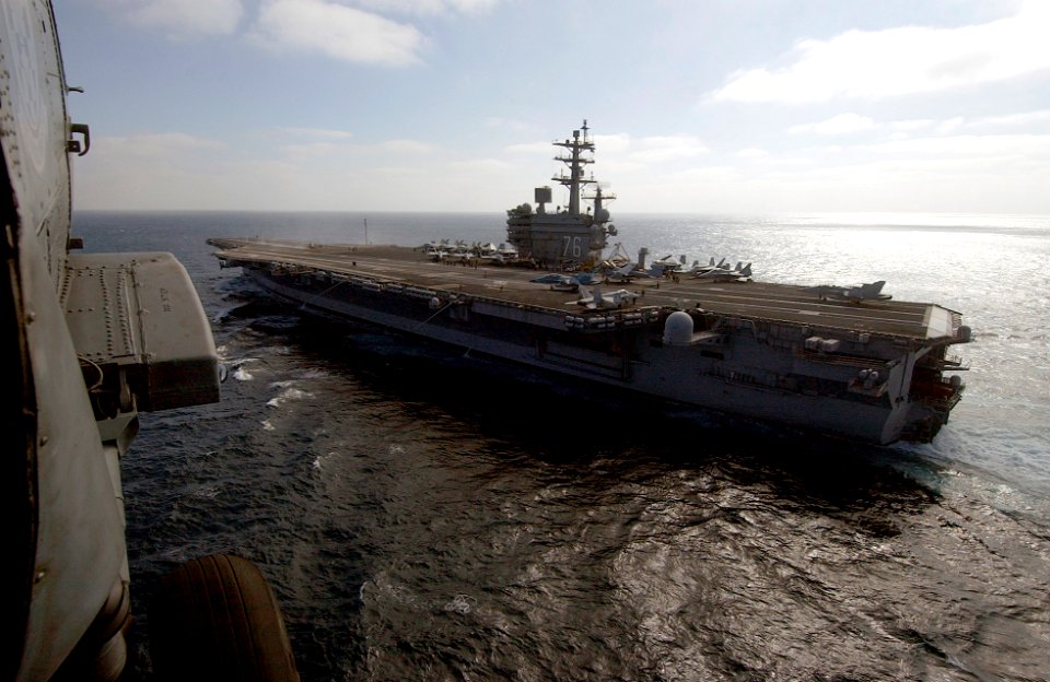 US Navy 061025-N-7130B-177 Following a plane guard search and rescue (SAR) mission, an SH-60F Seahawk assigned to the Black Knights of Helicopter Anti-submarine Squadron Four (HS-4) approaches USS Ronald Reagan (