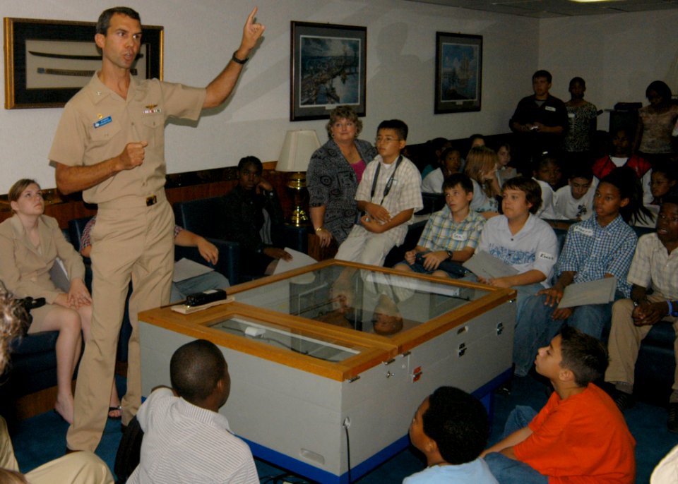 US Navy 061019-N-8546L-009 USS Blue Ridge (LCC 19) Commanding Officer, Capt. Jeff Bartkoski, gives children from the Advancement Via Individual Determination (AVID) program a brief introduction of the ship before beginning a to