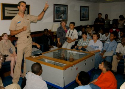 US Navy 061019-N-8546L-009 USS Blue Ridge (LCC 19) Commanding Officer, Capt. Jeff Bartkoski, gives children from the Advancement Via Individual Determination (AVID) program a brief introduction of the ship before beginning a to