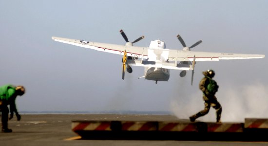 US Navy 061018-N-7130B-155 A C-2 Greyhound assigned to the Providers of Fleet Logistics Combat Support Squadron Three Zero (VRC-30) climbs skyward